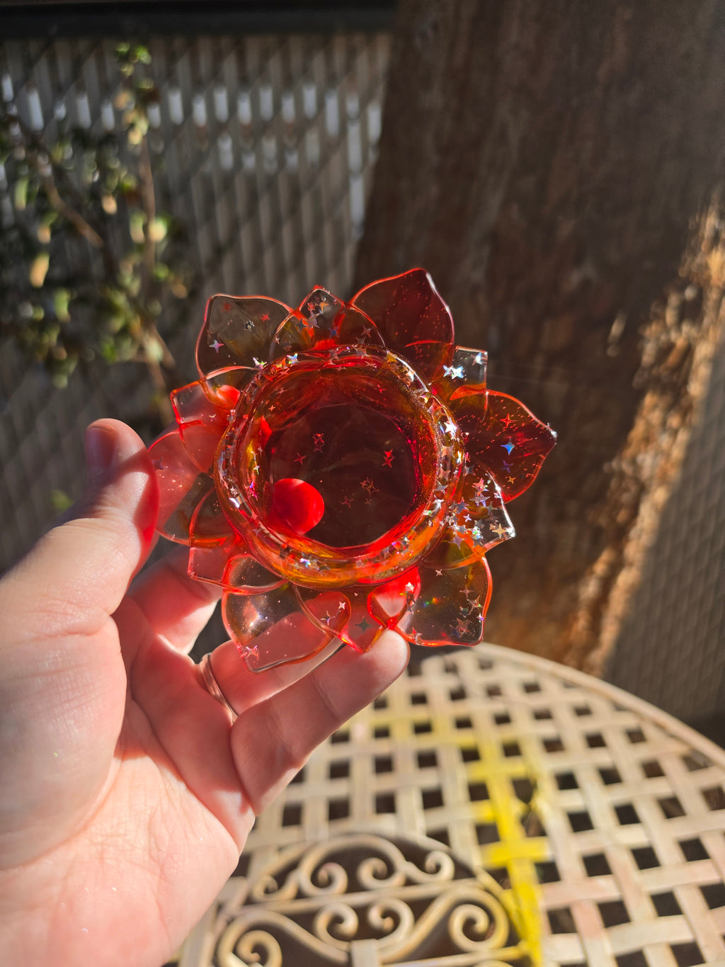 Full lotus flower resin throne from above showing all petal layers in crimson and clear resin