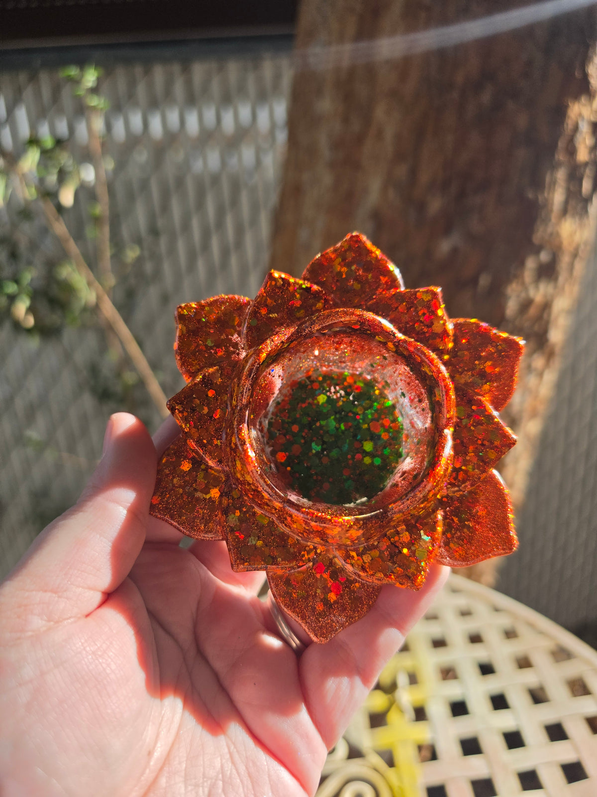 Autumn orange copper resin lotus tealight and dice throne, front view showing layered petals and glitter