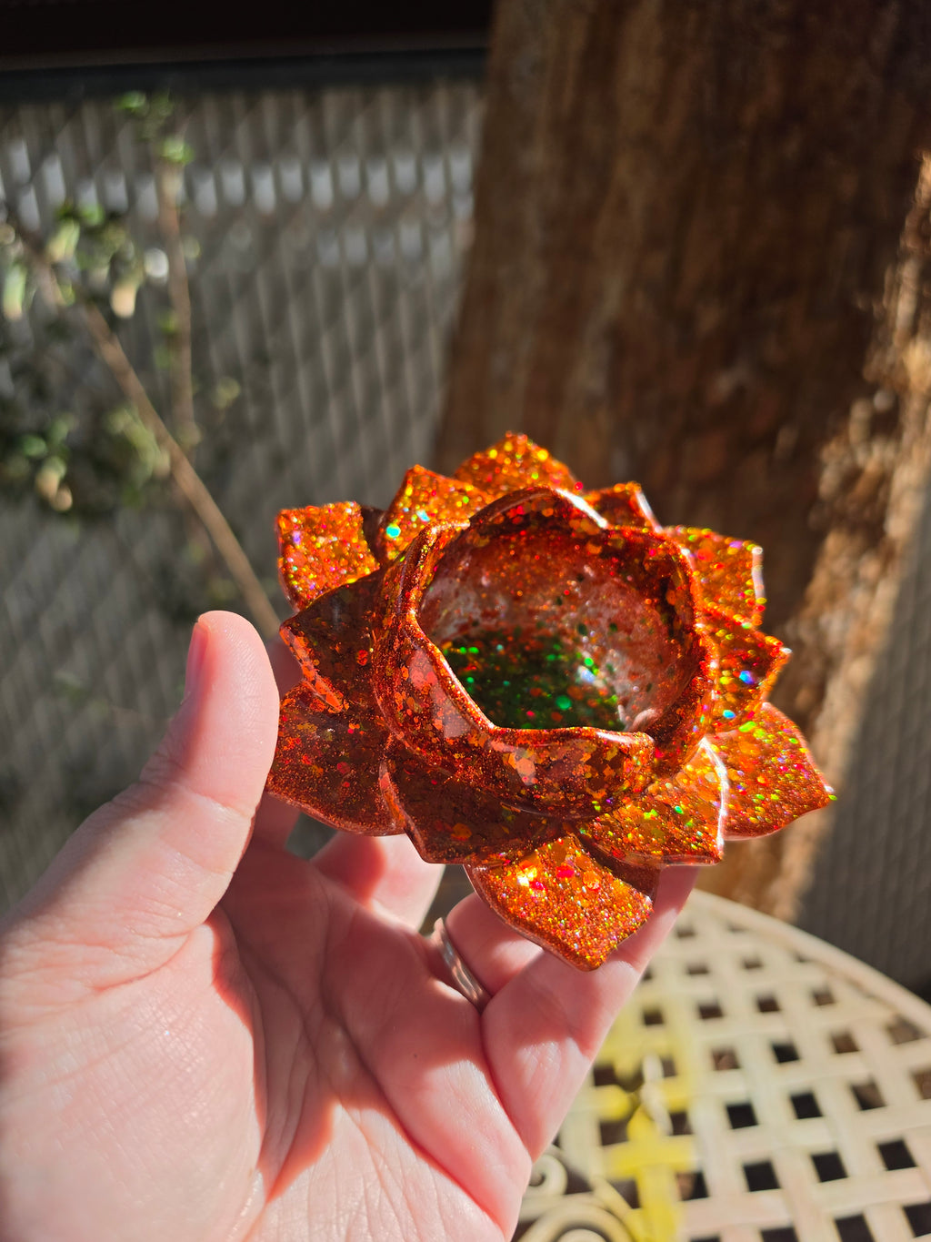 Top angled view of autumn lotus resin throne showing deep center bowl with multicolor glitter