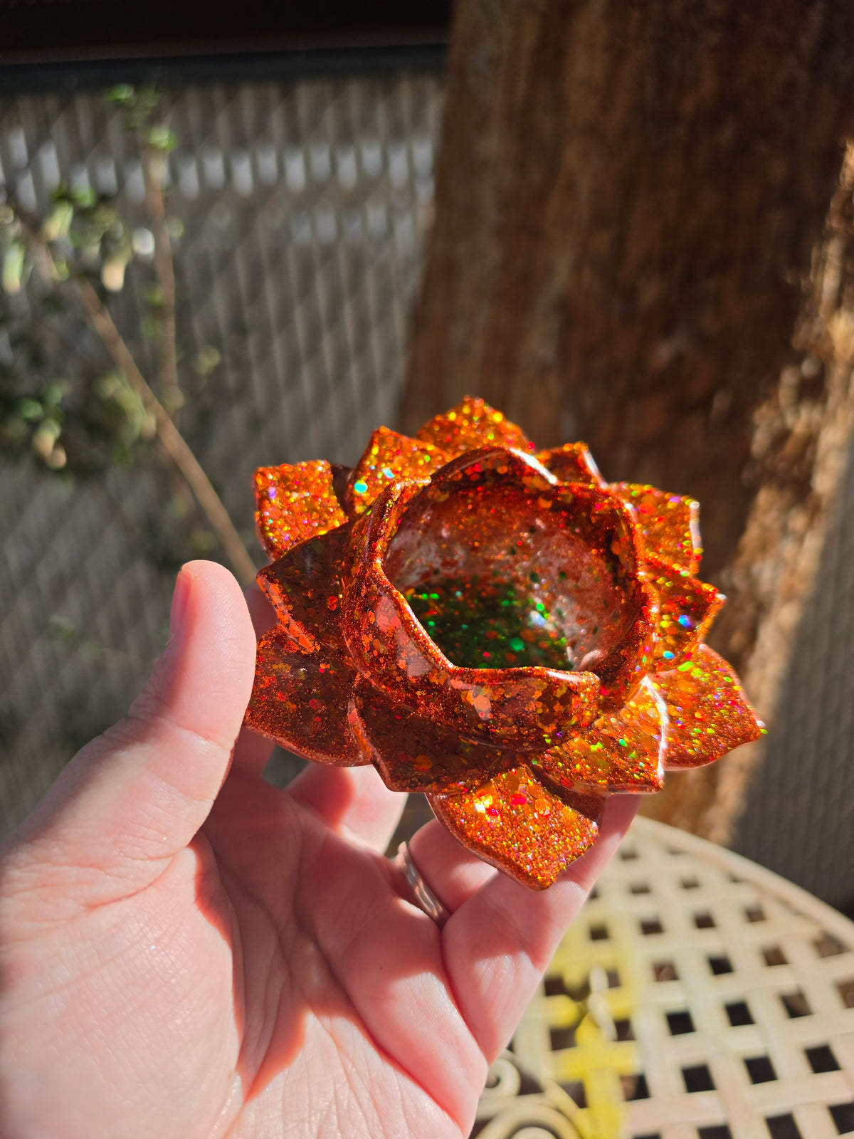 Top angled view of autumn lotus resin throne showing deep center bowl with multicolor glitter