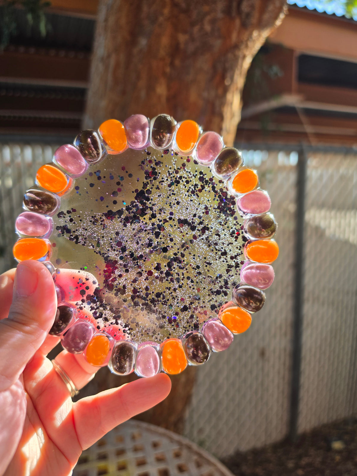 Glitter center and real jelly bean rim of a Halloween resin trinket tray