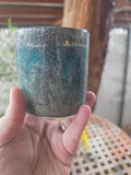 Northern Lights Cup with smoky tones, teal-blue swirls, and fine silver sparkle