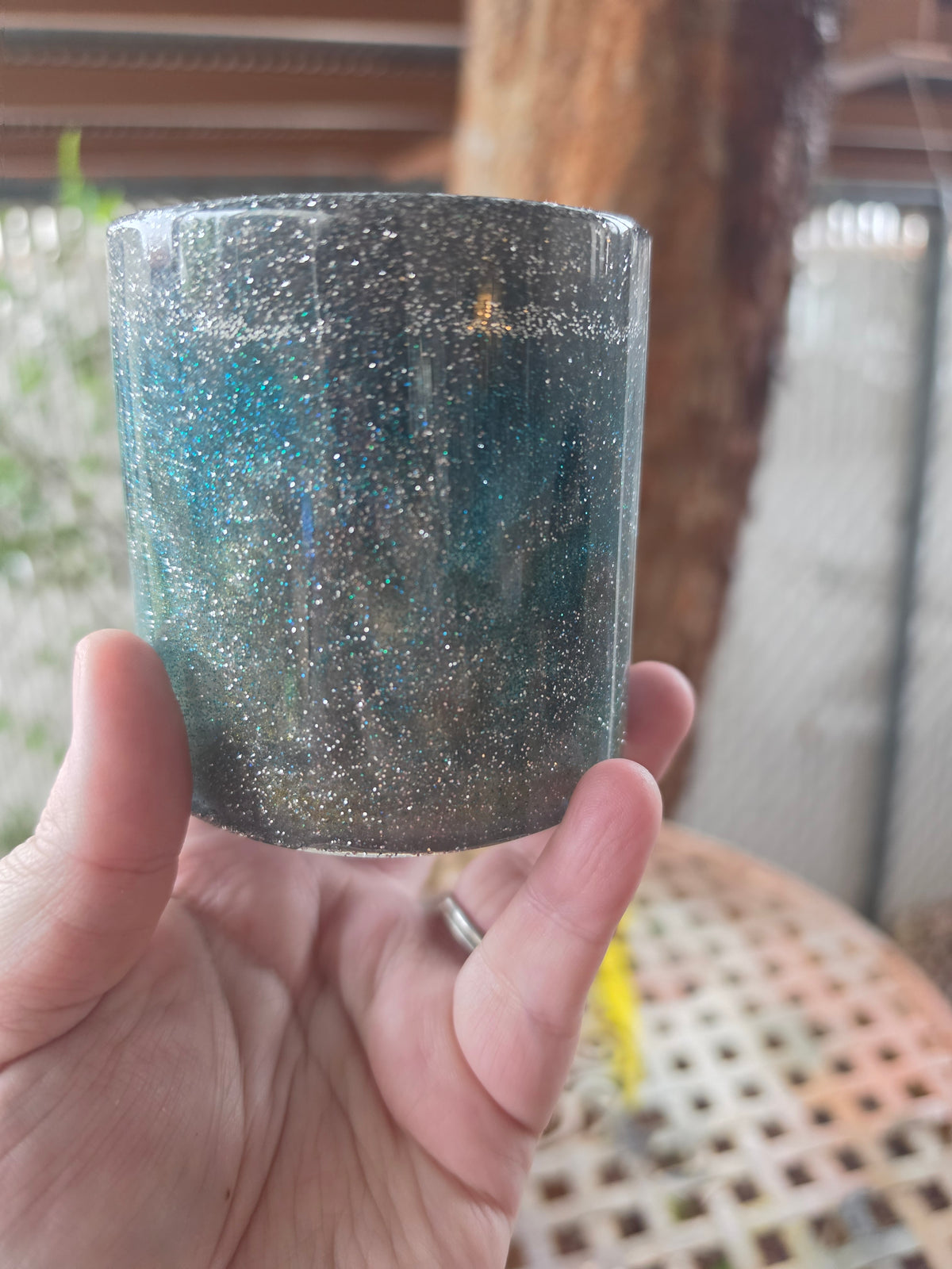 Northern Lights Cup with smoky tones, teal-blue swirls, and fine silver sparkle
